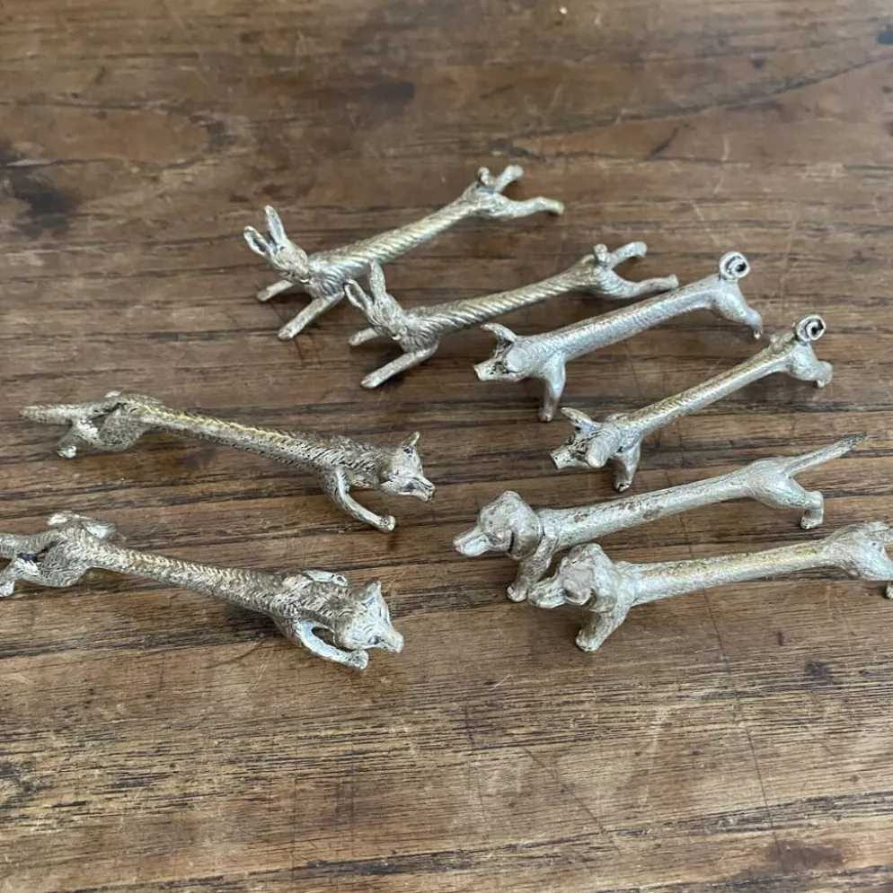 Suite de 8 porte-couteaux anciens en métal argenté Animaux