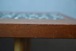 Table basse années 70 piétement fuseau teck et mosaïque céramique