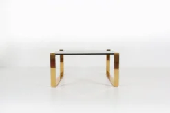 Table basse moderne du milieu du siècle avec base plaquée or et plateau en verre, années 1970.