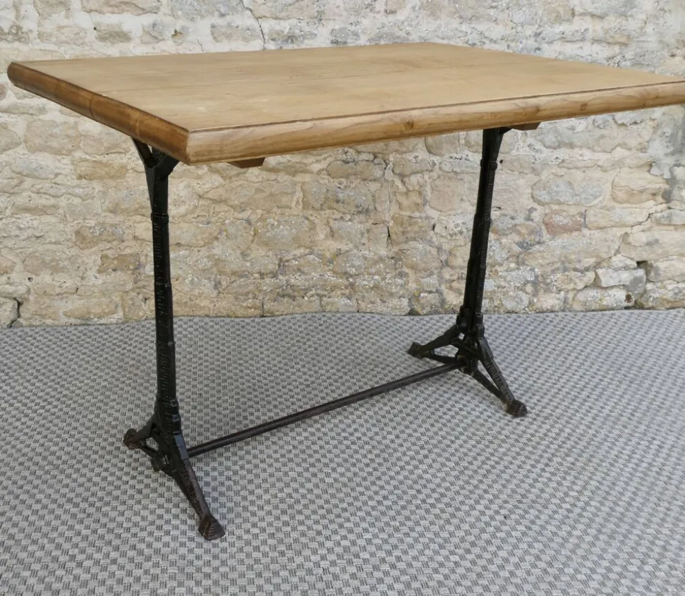 table de bistrot avec pieds en fonte signés Lelong, début XXème