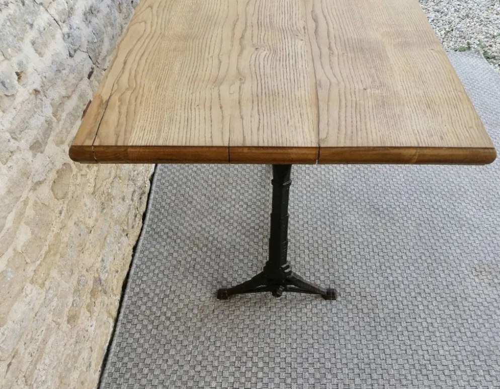 table de bistrot avec pieds en fonte signés Lelong, début XXème