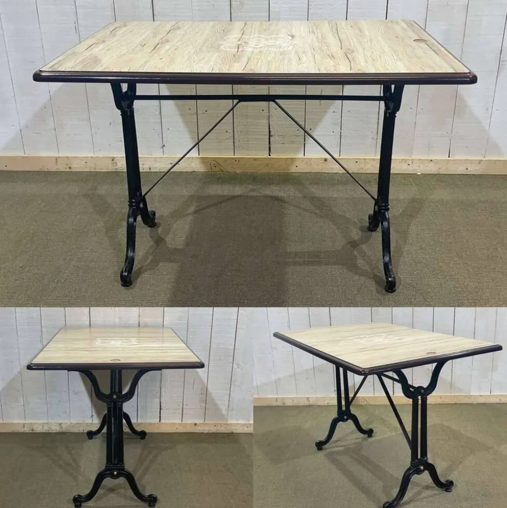 Table de bistrot - travail moderne, piétement en fonte