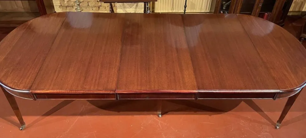 Table de salle à manger extensible Louis XVI en acajou à bandeau -19° siècl