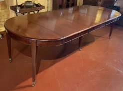Table de salle à manger extensible Louis XVI en acajou à bandeau -19° siècl
