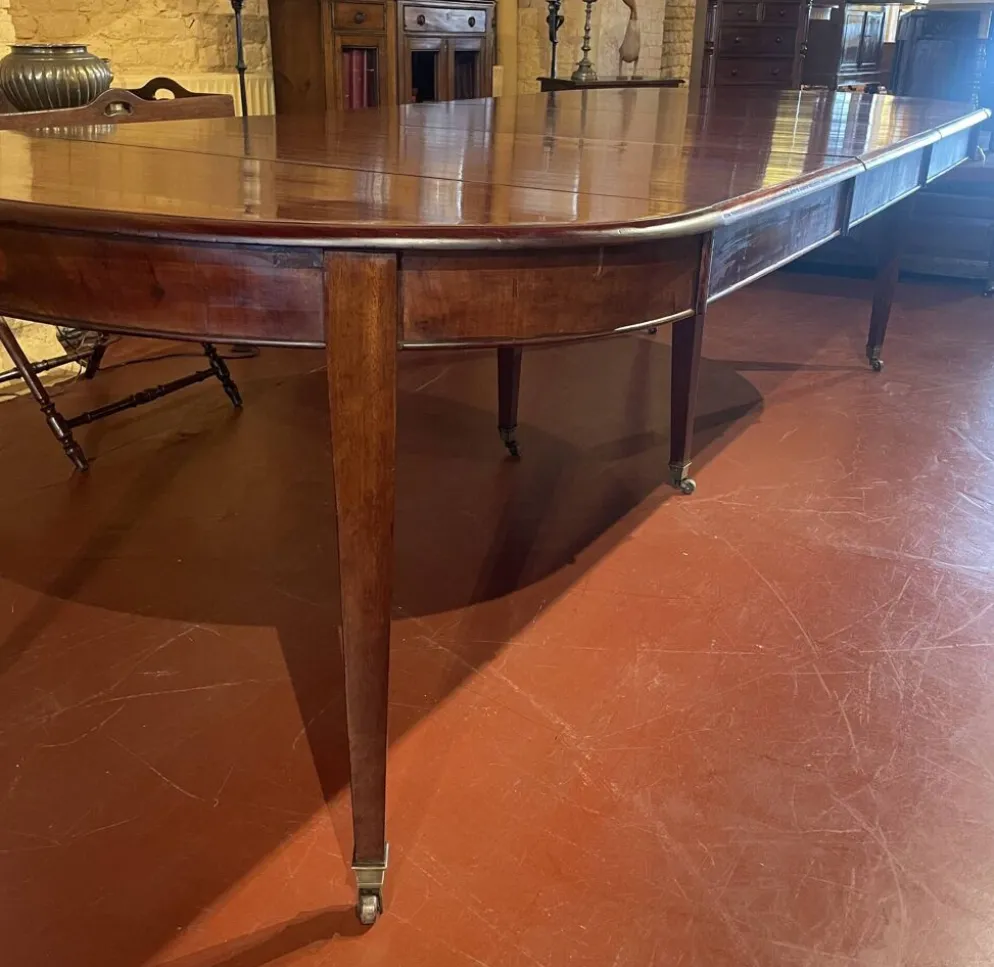 Table de salle à manger extensible Louis XVI en acajou à bandeau -19° siècl