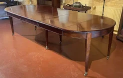 Table de salle à manger extensible Louis XVI en acajou à bandeau -19° siècl