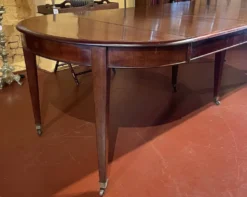 Table de salle à manger extensible Louis XVI en acajou à bandeau -19° siècl