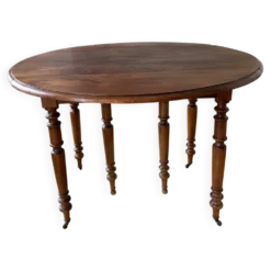 Table en noyer avec 6 pieds et 2 allonges
