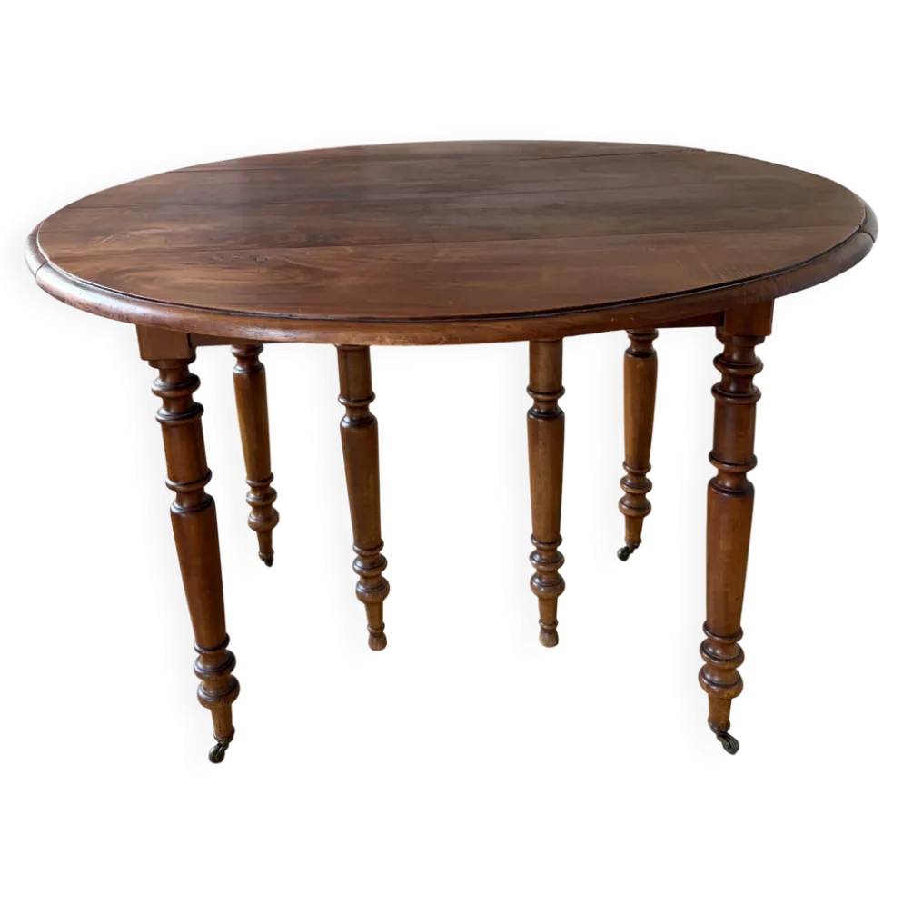 Table en noyer avec 6 pieds et 2 allonges