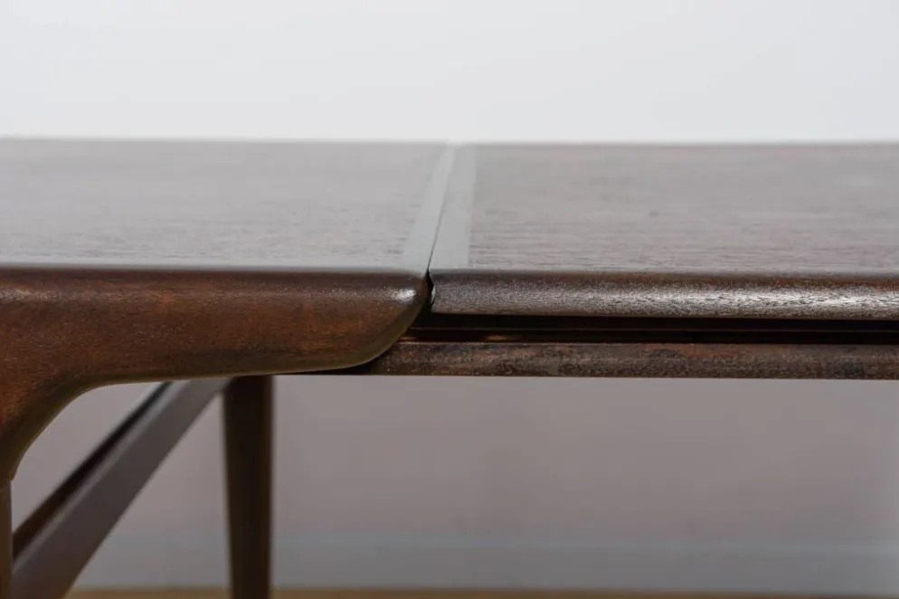 Table à manger extensible en teck de style mid-century conçue par Johannes Andersen pour Uldum Møbelfabrik, Danemark, années 1960.