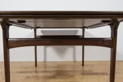 Table à manger extensible en teck de style mid-century conçue par Johannes Andersen pour Uldum Møbelfabrik, Danemark, années 1960.