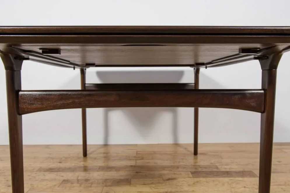 Table à manger extensible en teck de style mid-century conçue par Johannes Andersen pour Uldum Møbelfabrik, Danemark, années 1960.