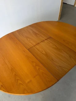 Table à manger extensible ronde à piètement en croix