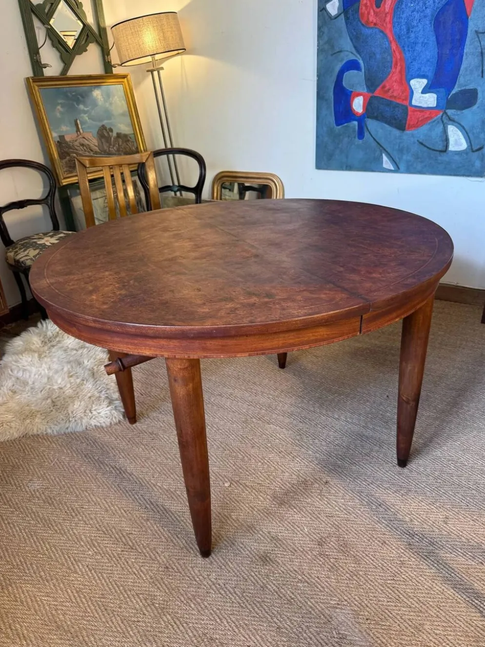 Table à manger ovale extensible en bois et placage en loupe de noyer