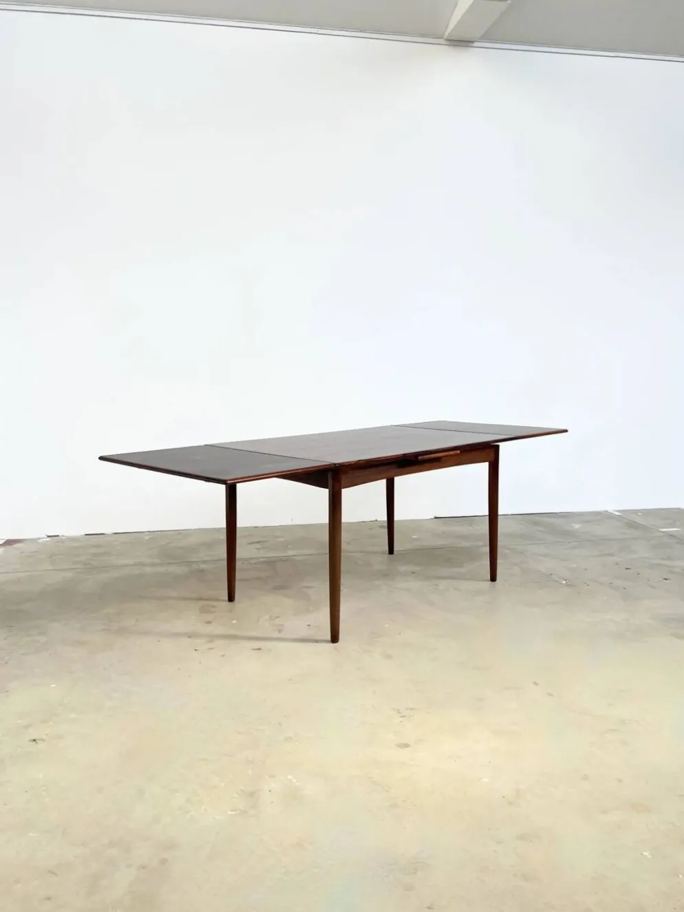 Table à manger palissandre à rallonges intégrées — Danemark, années 60