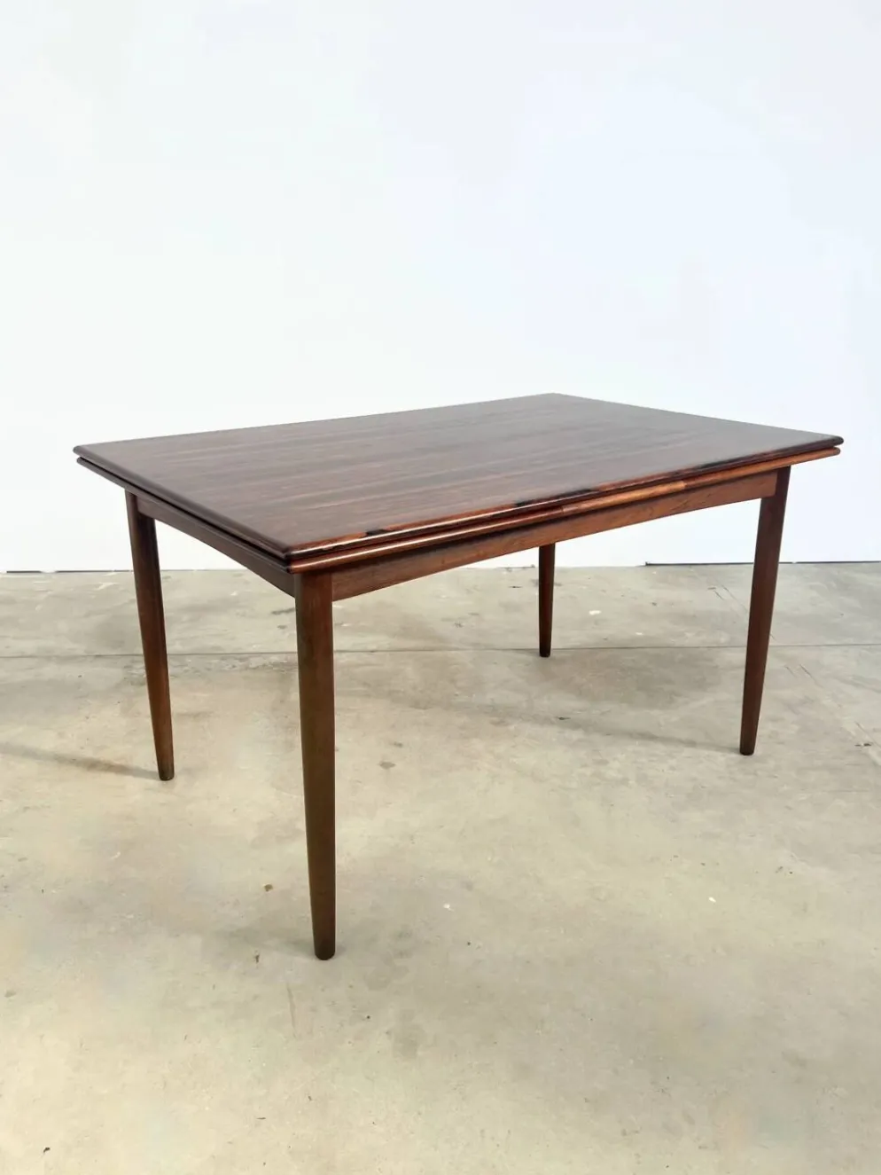 Table à manger palissandre à rallonges intégrées — Danemark, années 60