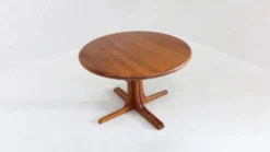 Table à manger ronde extensible vintage en teck massif des années 1960.