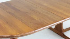 Table à manger ronde extensible vintage en teck massif des années 1960.