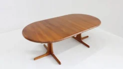 Table à manger ronde extensible vintage en teck massif des années 1960.