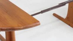 Table à manger ronde extensible vintage en teck massif des années 1960.