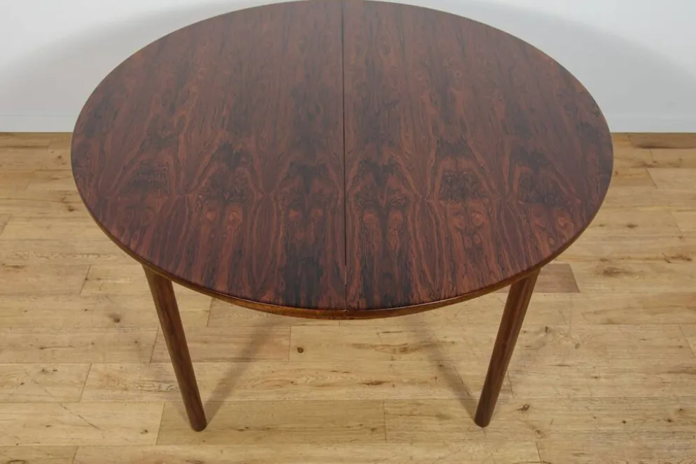Table à manger ronde extensible en palissandre du milieu du siècle de McIntosh, Royaume-Uni, années 1960.