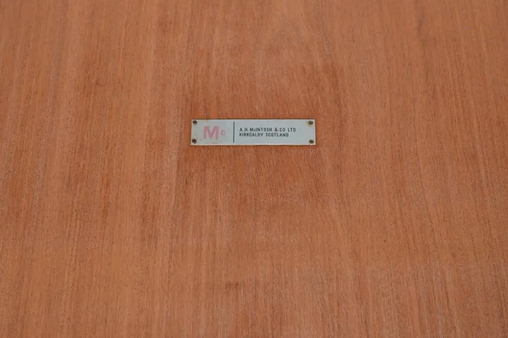 Table à manger ronde extensible en palissandre du milieu du siècle de McIntosh, Royaume-Uni, années 1960.