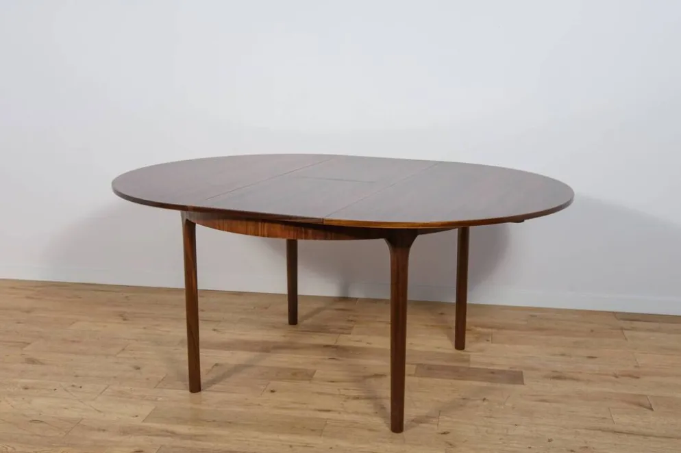 Table à manger ronde extensible en palissandre du milieu du siècle de McIntosh, Royaume-Uni, années 1960.