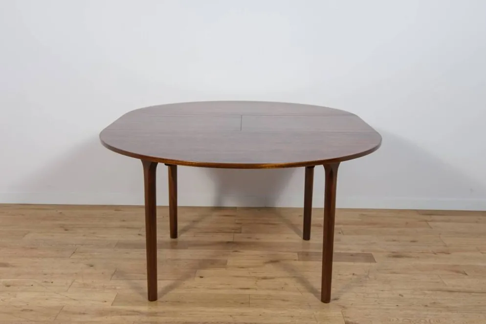 Table à manger ronde extensible en palissandre du milieu du siècle de McIntosh, Royaume-Uni, années 1960.