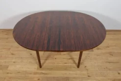 Table à manger ronde extensible en palissandre du milieu du siècle de McIntosh, Royaume-Uni, années 1960.