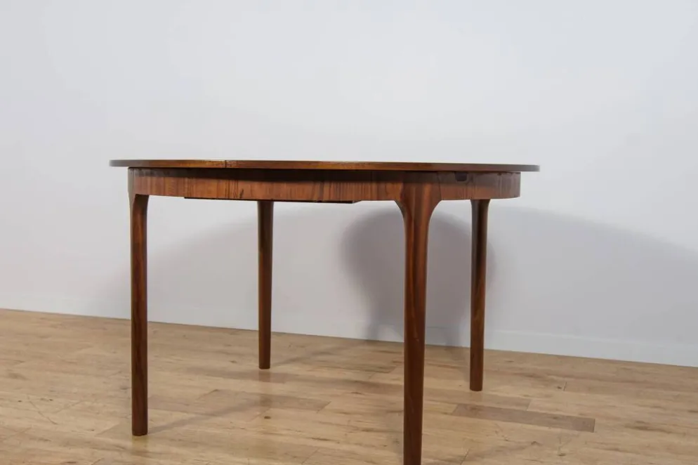 Table à manger ronde extensible en palissandre du milieu du siècle de McIntosh, Royaume-Uni, années 1960.