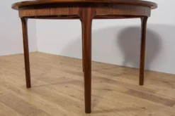 Table à manger ronde extensible en palissandre du milieu du siècle de McIntosh, Royaume-Uni, années 1960.