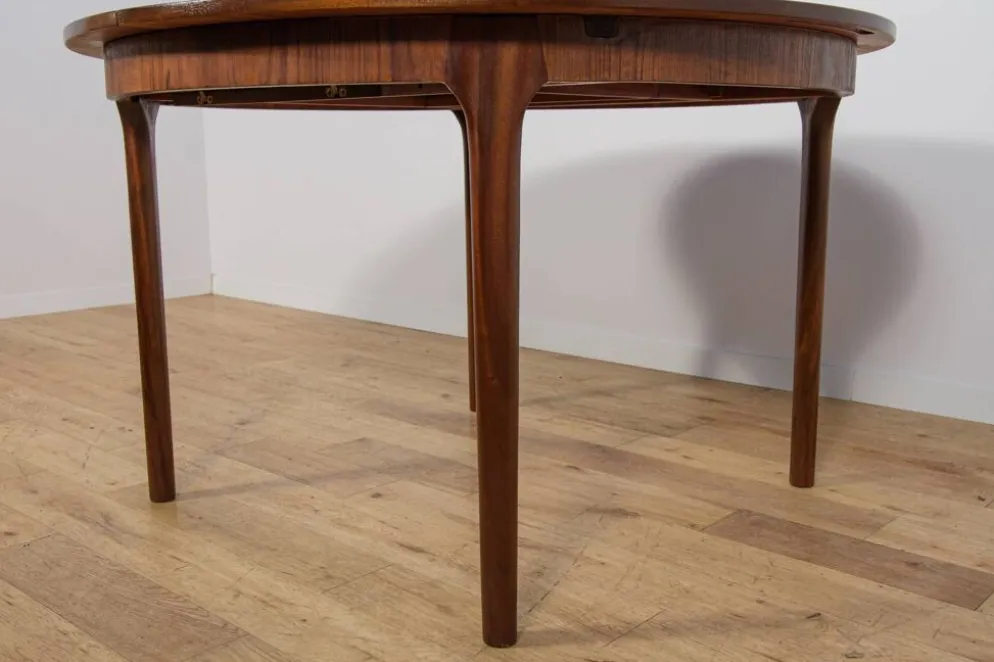 Table à manger ronde extensible en palissandre du milieu du siècle de McIntosh, Royaume-Uni, années 1960.