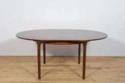 Table à manger ronde extensible en palissandre du milieu du siècle de McIntosh, Royaume-Uni, années 1960.