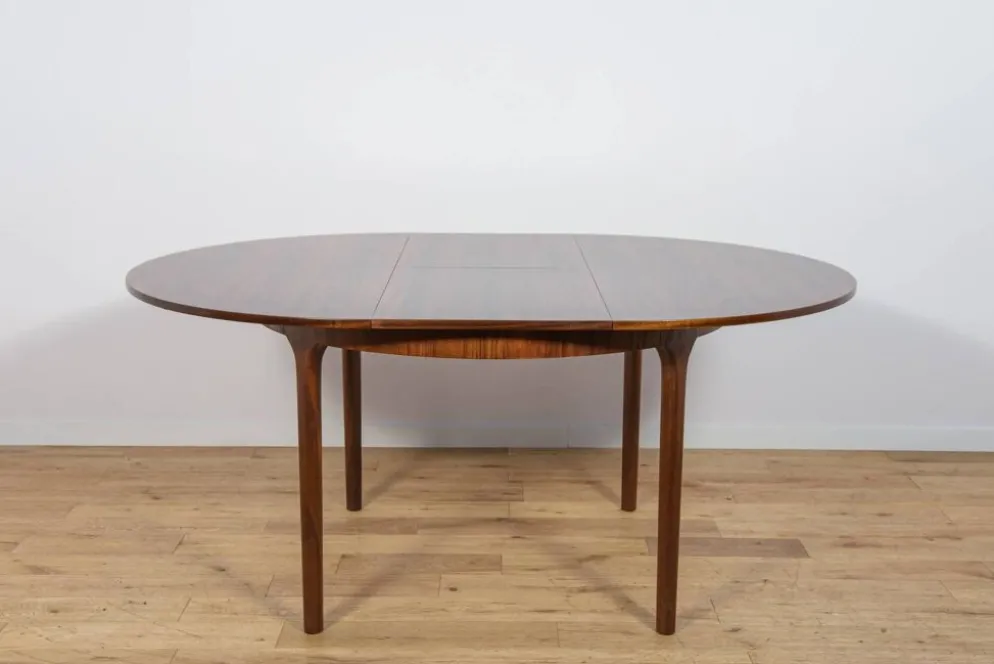 Table à manger ronde extensible en palissandre du milieu du siècle de McIntosh, Royaume-Uni, années 1960.