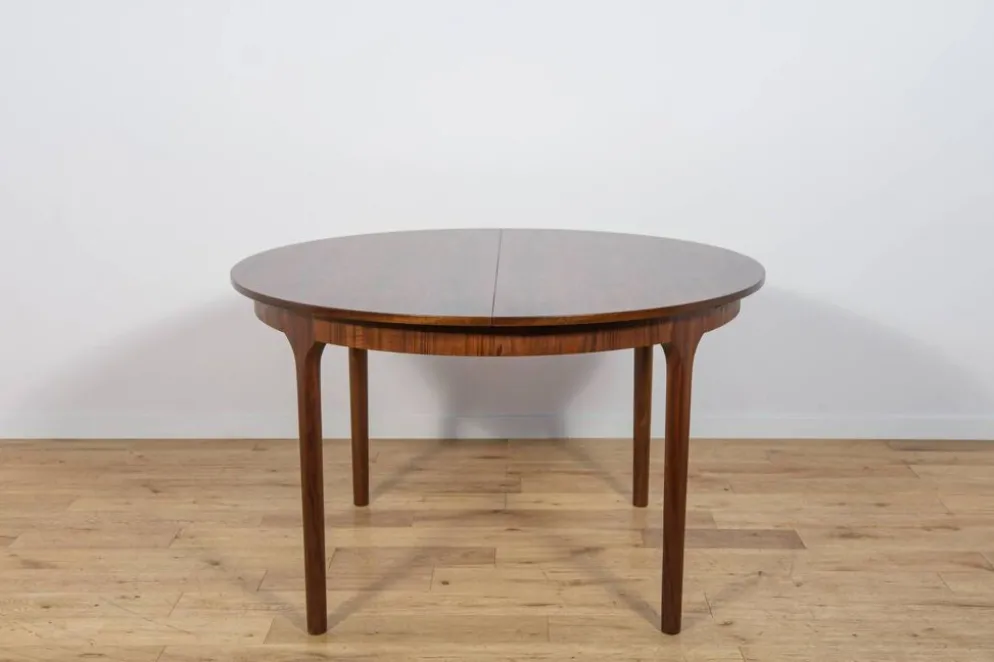 Table à manger ronde extensible en palissandre du milieu du siècle de McIntosh, Royaume-Uni, années 1960.