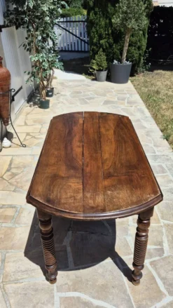 Table à manger ronde à plateau rabattable en noyer massif, fin 19ème