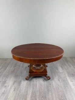 Table ovale de style Empire à pied central, XIXe siècle