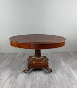 Table ovale de style Empire à pied central, XIXe siècle