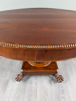 Table ovale de style Empire à pied central, XIXe siècle