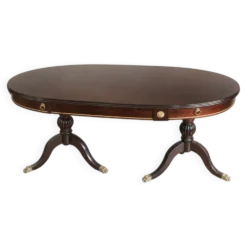 Table ovale extensible en acajou verni, pattes de lion et détails doré