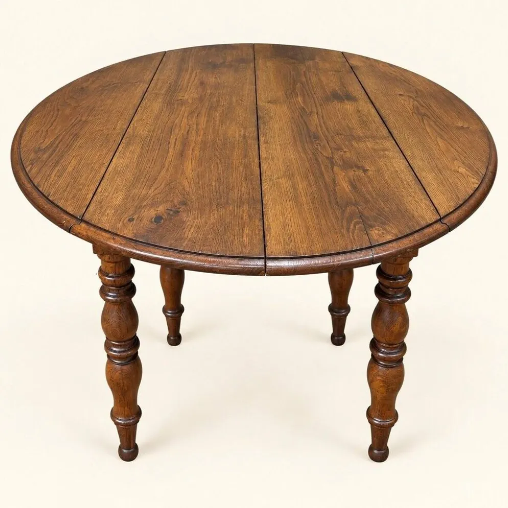 Table ovale extensible Louis-Philippe chêne massif XIXe siècle