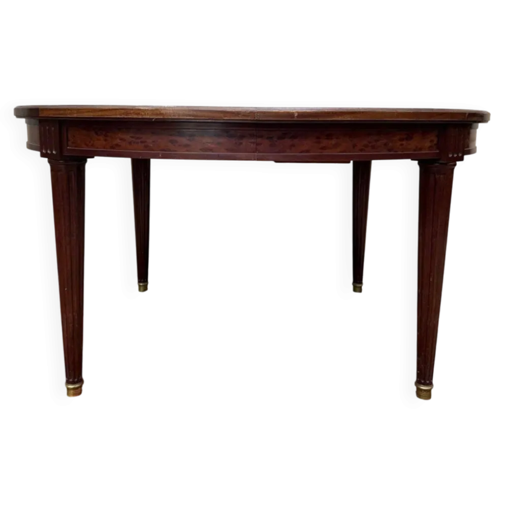 Table ovale extensible style Louis XVI – Acajou moucheté – XIXe siècle