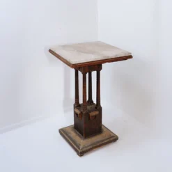 Table piédestal en bois et marbre