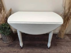 Table ronde en acajou convertible en console