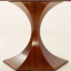 Table ronde en palissandre de Carlo de Carli, années 1960.