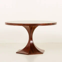 Table ronde en palissandre de Carlo de Carli, années 1960.