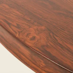 Table ronde en palissandre de Carlo de Carli, années 1960.