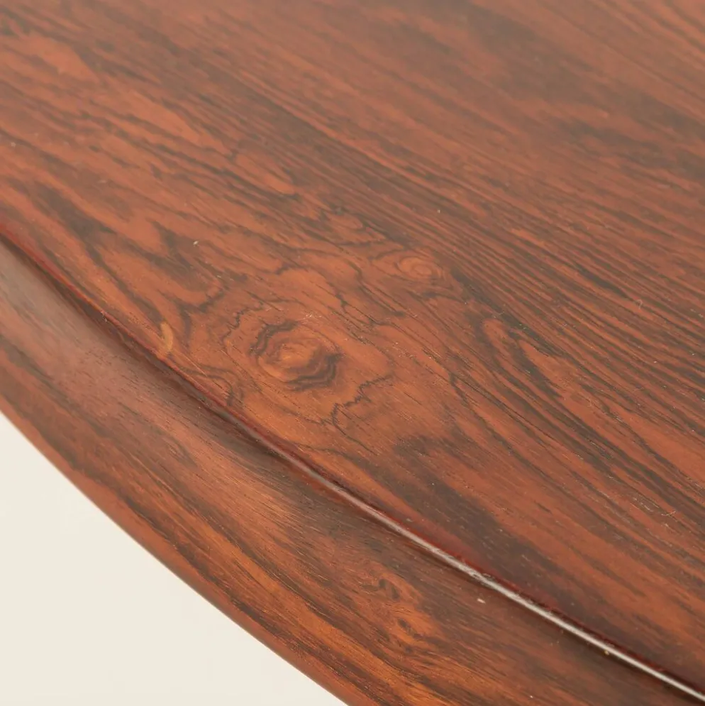 Table ronde en palissandre de Carlo de Carli, années 1960.