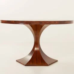 Table ronde en palissandre de Carlo de Carli, années 1960.