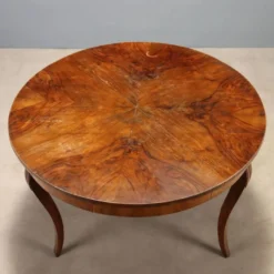 Table ronde élégante avec tiroir et pieds galbés